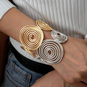 Exaggerated metal geometric spiral open bracelet in layered gold and silver finish