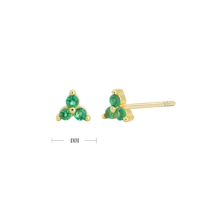 Detailed macro view of 4mm gold S925 silver triangle flower studs with green gemstones