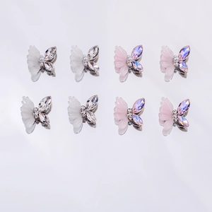 3D resin butterfly nail art charms with crystals and pearls in white and pink