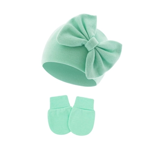 Detail of mint green baby knitted beanie with bow and matching anti-scratch mittens