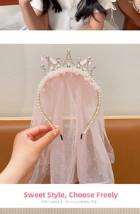 Detail of pink princess crown headband with faux pearls and sparkling sequined tulle veil