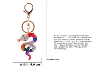 Detailed view of colorful rhinestone snake keychain with specific dimension measurements