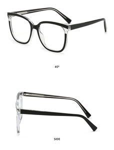 Detailed view of bicolor black and transparent eyeglass frames with silver hinges