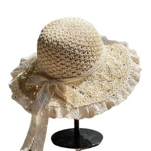Foldable handmade lace edge straw sun hat with bow tie and hollow weave for summer