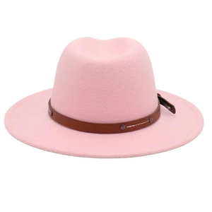 Detail of pink fedora hat featuring a brown leather belt with metallic rivet accents