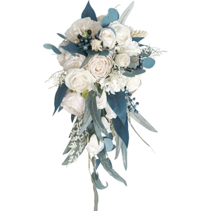 Elegant waterfall bridal bouquet with white roses and blue berries for wedding photography