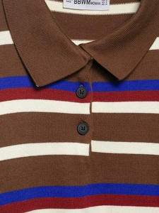 Detail of multi-color striped knit sweater featuring polo collar and two black buttons