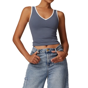 Slim fit V-neck racerback sports tank top with white contrast trim in grey blue color