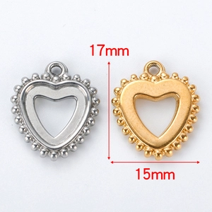 Detail showing dimensions of heart-shaped stainless steel charms in gold and silver