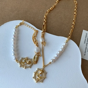 Vintage style set of natural pearl necklace and bracelet with gold rose pendant details