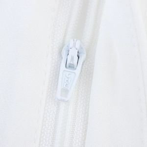 White CHE embossed zipper puller accessory with high-quality woven tape detail