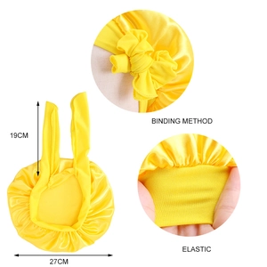 Tabella taglie cuffia in raso giallo per bambini con misure elastiche di 19cm e 27cm