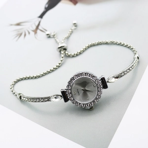 Elegant silver quartz bracelet watch with rhinestone accents and adjustable slider clasp