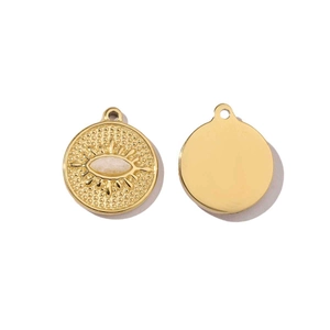 Detailed view of heart-shaped gold pendants with beige stone inlay and eye engraving