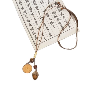 Handmade vintage forest style necklace with acorn pendant and wooden beads on calligraphy