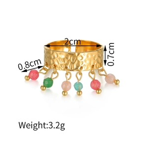 Detailed view of 0.7cm wide gold hammered band with colorful stone beads and dimensions