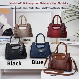 Matrix display of five stone pattern buckets bags in khaki, red, blue, and black colors