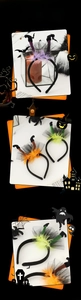 Detail of Halloween witch leg headbands in purple, green and orange with feathers