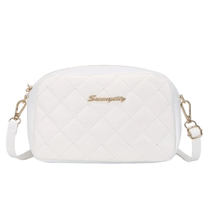 White quilted crossbody camera bag with classic diamond stitching and gold hardware