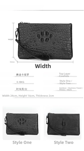 Macro view of black crocodile pattern leather clutch with metal hardware details