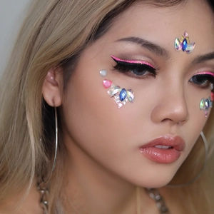 Creative face rhinestone stickers with colorful heart patterns for festival makeup looks
