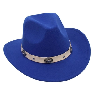 Detail of blue wool felt cowboy hat with white leather band and carved silver metal buckles