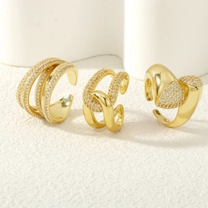 Detailed view of layered 18K gold plated zircon rings with sparkling micro-pave setting