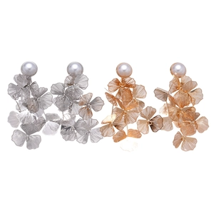Elegant hollow mesh flower petal earrings with large faux pearls in gold and silver