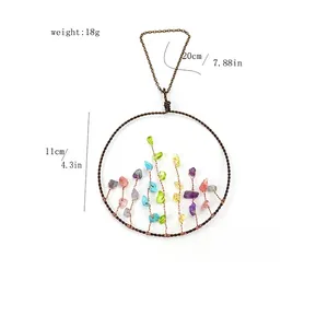 Handmade Tree of Life wall hanging with colorful crystal stones and wire weaving