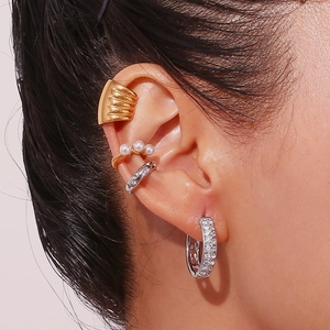 18K gold plated heart ear cuffs with pearls and crystals shown on a model