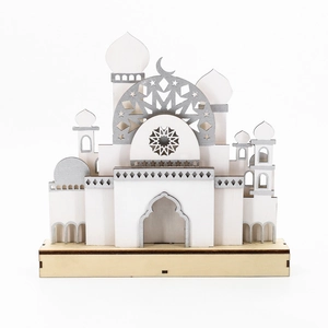 Detail of wooden mosque model with Islamic star patterns and moon symbol for Eid decor