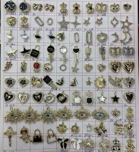 Detailed collection of alloy bear and star charms with zircon and faux pearl inlays