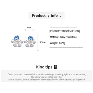 Detail showing vintage fan earrings dimensions and blue rhinestone alloy materials