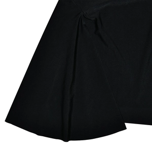 Detailed close-up of the black synthetic fabric showing high elasticity and smooth glossy texture