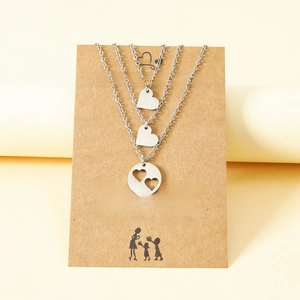 Three-piece stainless steel mother and daughter necklace set with heart cutout pendants