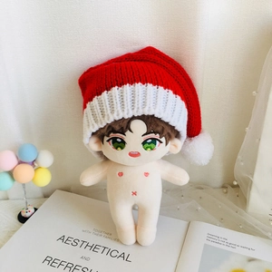 Cute 20cm cotton doll wearing a festive red and white knitted Christmas beanie hat