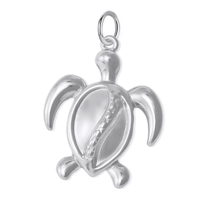 Detailed macro view of 18k plated turtle pendant with intricate shell carvings