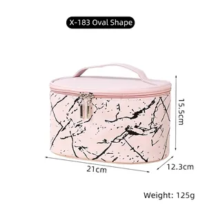 Pink marble PU makeup bag with dual metal zippers and oval handle design detail