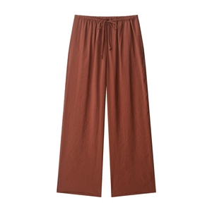 Red brown loose high-waisted wide-leg pants with elastic drawstring waist on white background