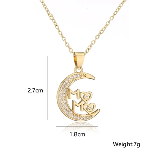 Macro detail of 18K gold plated crescent moon pendant with MOM text and size dimensions