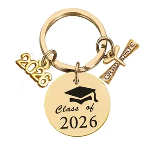 Golden Class of 2026 graduation keychain featuring a graduate scroll and 2026 charm