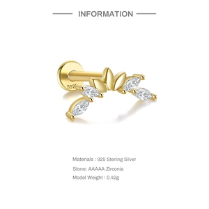 Macro detail of S925 sterling silver dragonfly stud earring with marquise zirconia