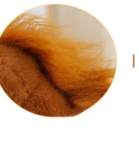 Close-up of the plush brown faux mane with high-quality stitching on the horse toy