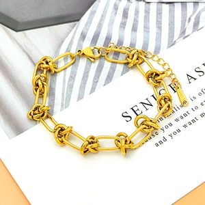Bracelet à maillons épais en acier inoxydable plaqué or 18K avec détail de nœud