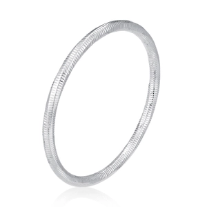 Detailed view of silver hollow stainless steel bangle with horizontal textured grooves