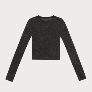 Close-up of slim fit charcoal cropped knit top with metallic glitter finish and crew neck
