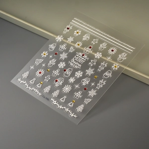 5D Christmas nail art stickers with white embossed Santa, reindeer, and snowflakes