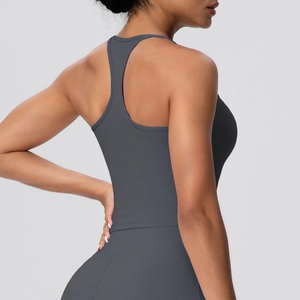 Detail view of charcoal racerback sports top featuring high-elasticity performance fabric