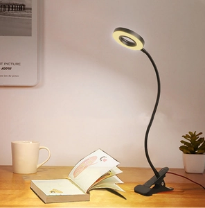 Black LED clip-on desk lamp with flexible gooseneck and warm light for bedside reading