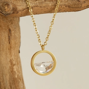18K gold plated stainless steel necklace featuring a clear crystal openwork pendant